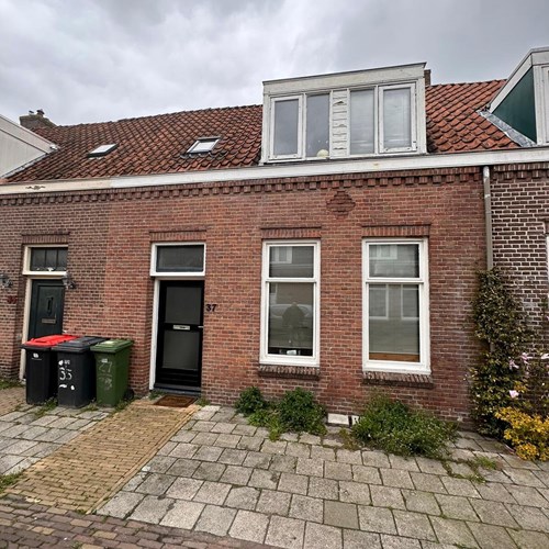 Sneek, 1e Woudstraat, tussenwoning - foto 1